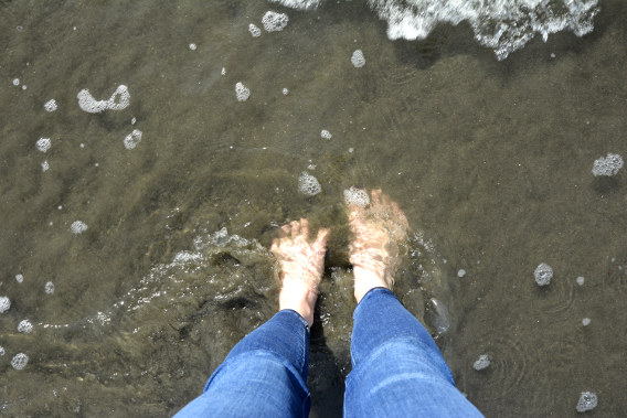 Feet in Pacific Ocean